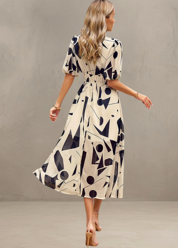 ASTELLA | ROBE MIDI FLORALE FLATTEUSE