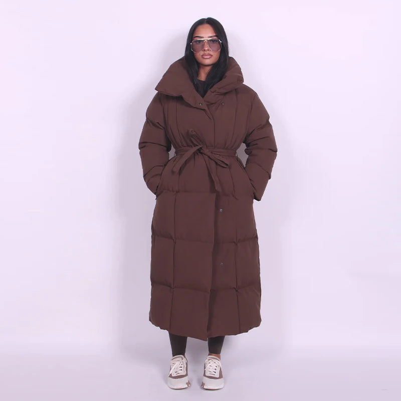 Chaud femmes gonflé matelassé à capuche Long coton manteau ample solide col montant à lacets fermeture éclair pardessus 2025 hiver dame vêtements d'extérieur
