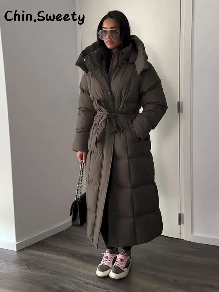 Chaud femmes gonflé matelassé à capuche Long coton manteau ample solide col montant à lacets fermeture éclair pardessus 2025 hiver dame vêtements d'extérieur