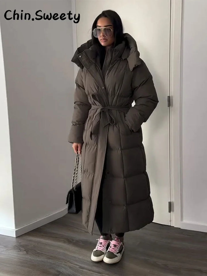 Chaud femmes gonflé matelassé à capuche Long coton manteau ample solide col montant à lacets fermeture éclair pardessus 2025 hiver dame vêtements d'extérieur