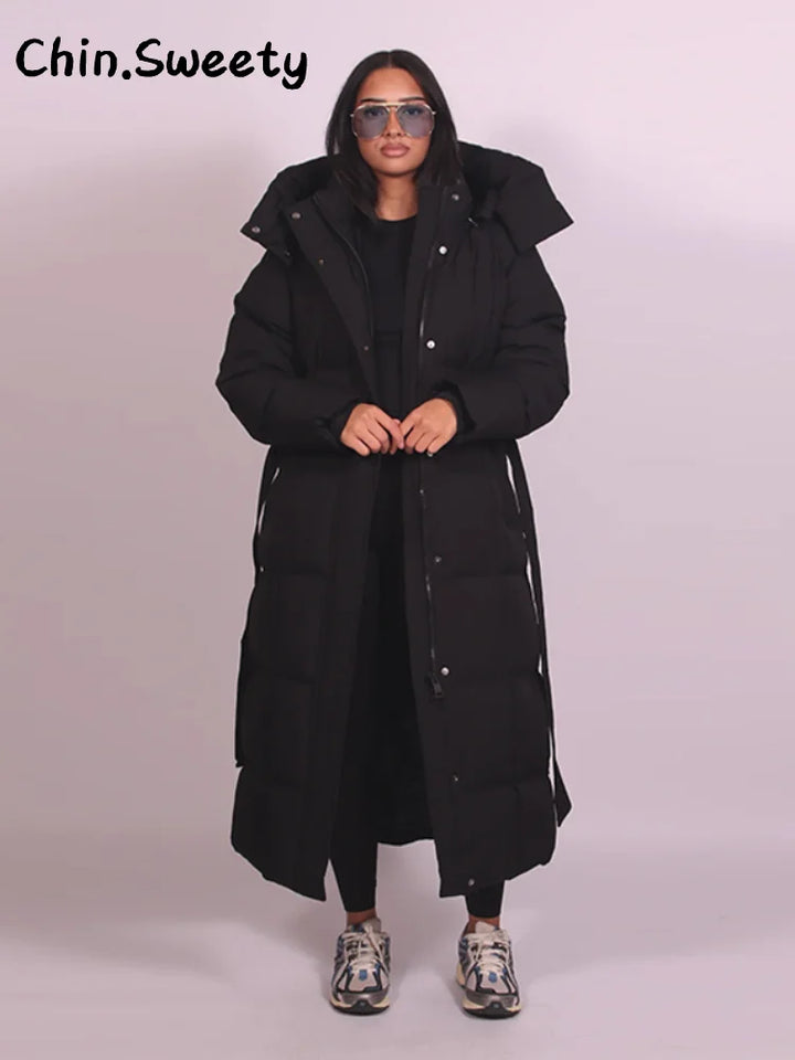 Chaud femmes gonflé matelassé à capuche Long coton manteau ample solide col montant à lacets fermeture éclair pardessus 2025 hiver dame vêtements d'extérieur
