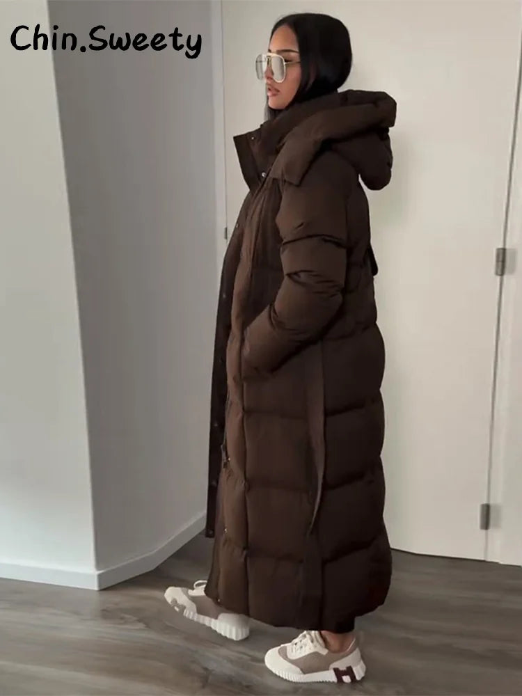 Chaud femmes gonflé matelassé à capuche Long coton manteau ample solide col montant à lacets fermeture éclair pardessus 2025 hiver dame vêtements d'extérieur