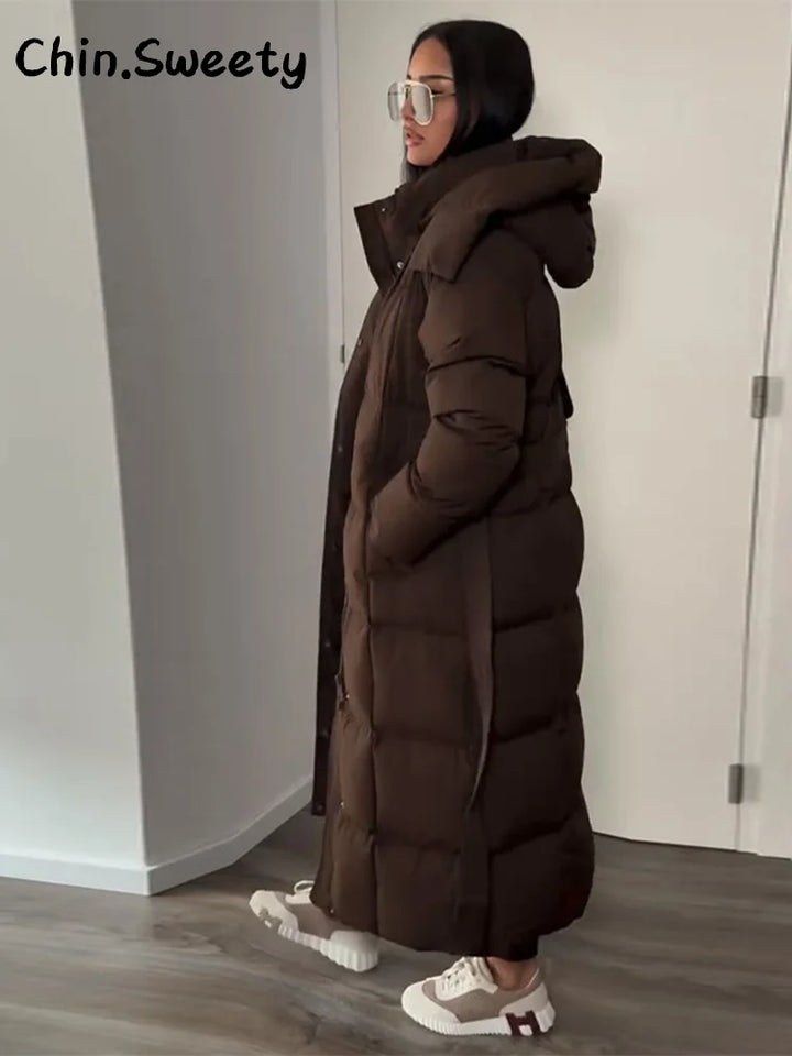 Chaud femmes gonflé matelassé à capuche Long coton manteau ample solide col montant à lacets fermeture éclair pardessus 2025 hiver dame vêtements d'extérieur