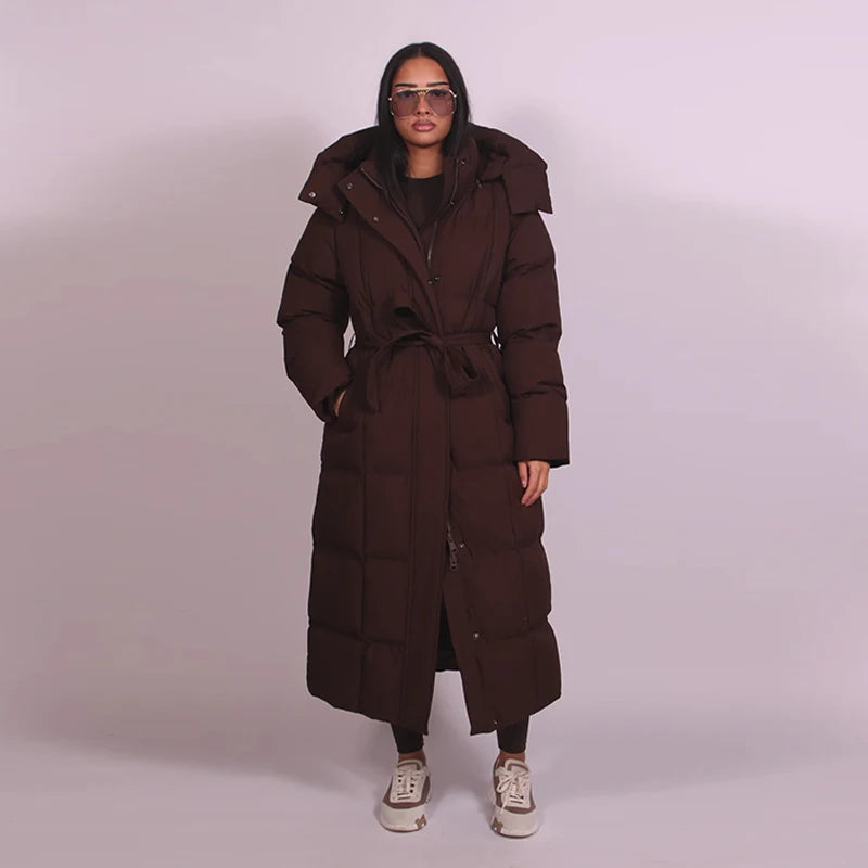 Chaud femmes gonflé matelassé à capuche Long coton manteau ample solide col montant à lacets fermeture éclair pardessus 2025 hiver dame vêtements d'extérieur