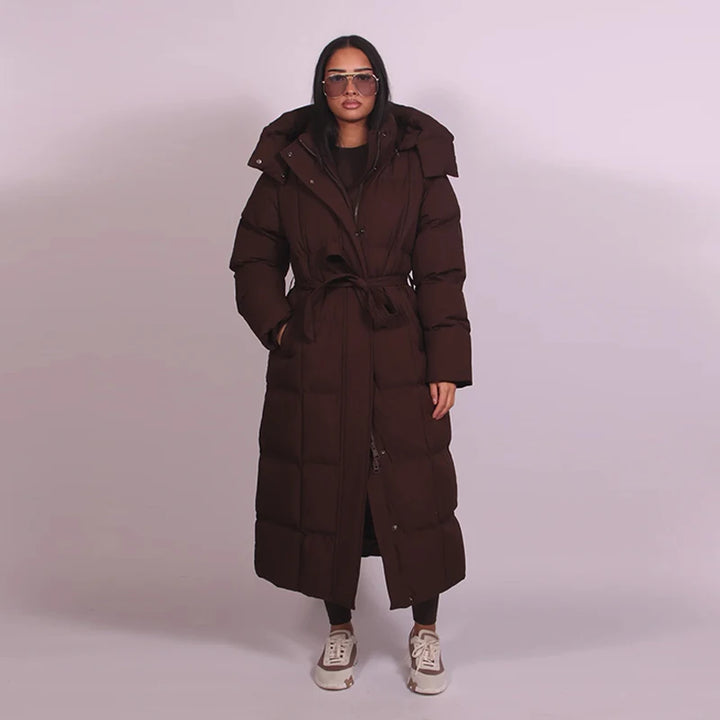 Chaud femmes gonflé matelassé à capuche Long coton manteau ample solide col montant à lacets fermeture éclair pardessus 2025 hiver dame vêtements d'extérieur
