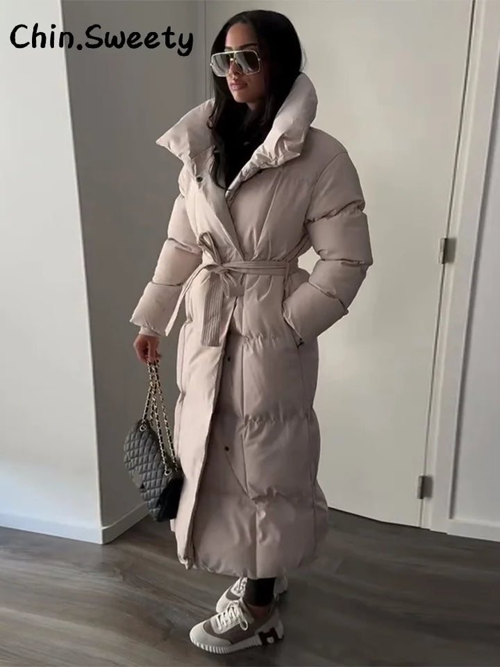 Chaud femmes gonflé matelassé à capuche Long coton manteau ample solide col montant à lacets fermeture éclair pardessus 2025 hiver dame vêtements d'extérieur