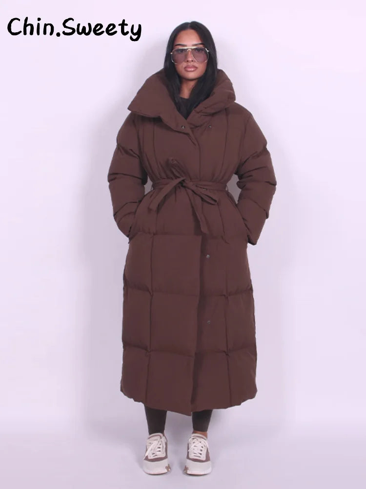 Chaud femmes gonflé matelassé à capuche Long coton manteau ample solide col montant à lacets fermeture éclair pardessus 2025 hiver dame vêtements d'extérieur