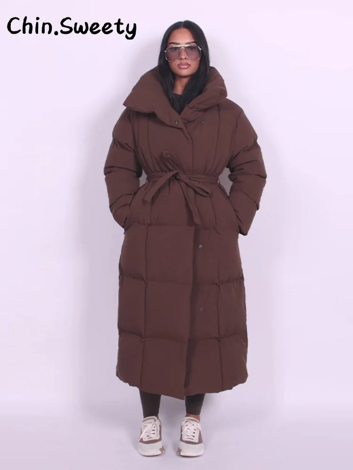Chaud femmes gonflé matelassé à capuche Long coton manteau ample solide col montant à lacets fermeture éclair pardessus 2025 hiver dame vêtements d'extérieur