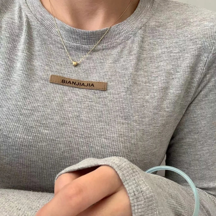 Collier Cœur Élégant au Design Intemporel Femme